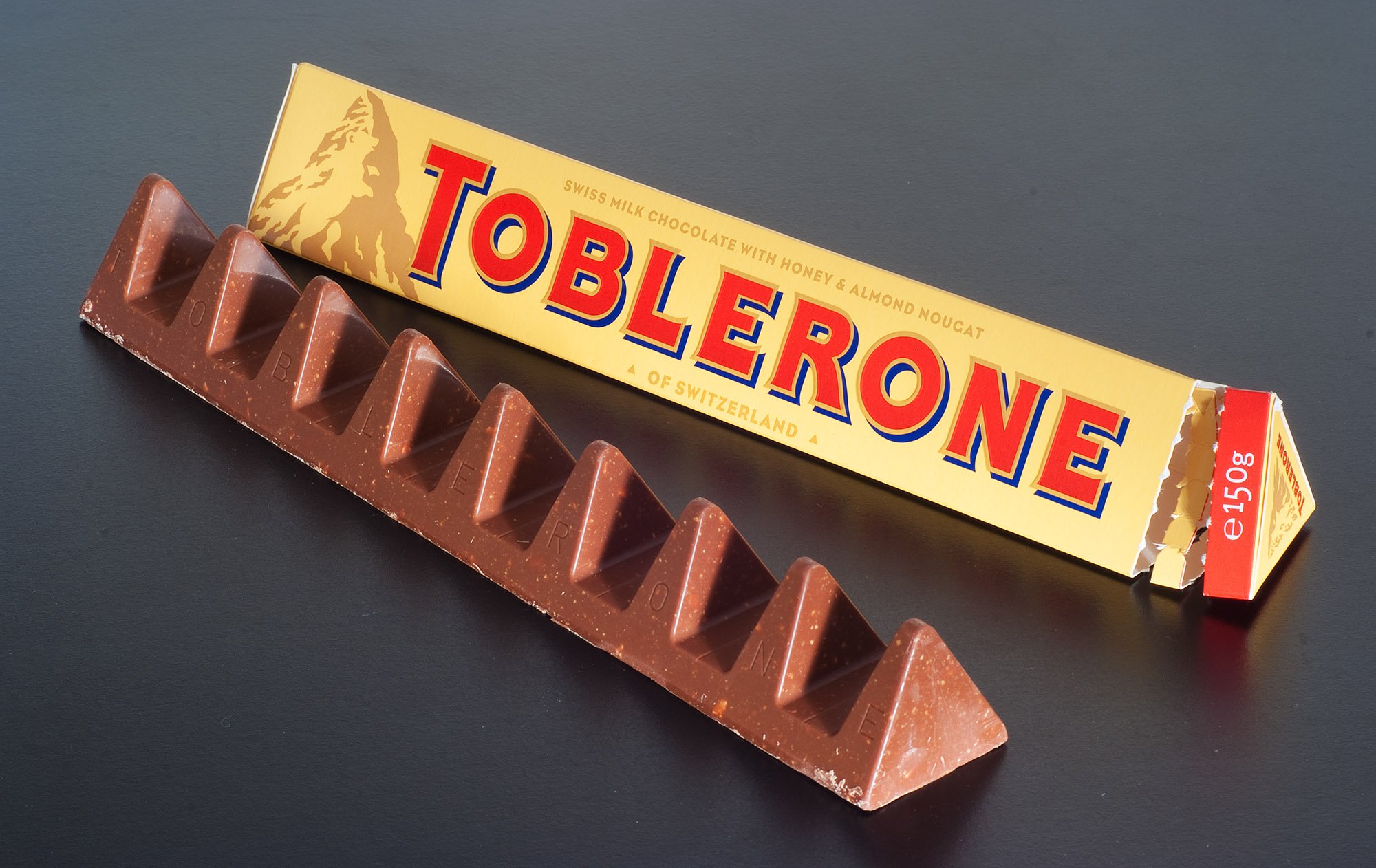 toblerone swiss milk chocolate with honey & almond nougat – imported chocolate bar toblerone swiss milk chocolate with honey & almond nougat – imported chocolate bar